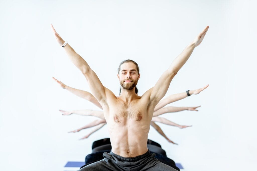 Man in yoga pose with multiple arms on the background